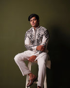 Noir Crest Off-white Embroidered Kurta Set
